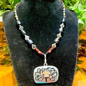 Beaded pendant necklace, black, silver, red/orange